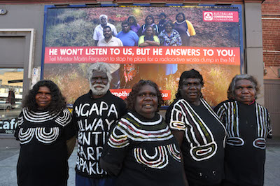 Pic by Dominic O'Brien. Traditional owners from Muckaty, near Tennant Creek, NT come to Melbourne for legal meetings about their federal court case against a nuclear waste dump on their country. L to R Posing infront of a billboard in Northcote are Gladys Brown, Mark Lane, Jeannie Sambo, Dianne Stokes and Doris Kelly.